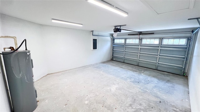 4413 Grass Ave, Sebring, FL 33875 - garage featuring electric water heater and a garage door opener