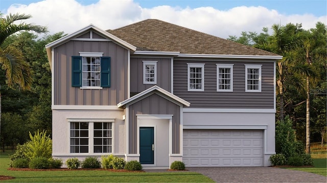 2907 Haze Rd, Clermont, FL 34714 - view of front of house featuring board and batten siding, an attached garage, and driveway