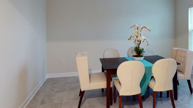 2907 Haze Rd, Clermont, FL 34714 - tiled dining space featuring baseboards
