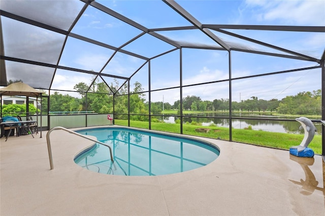 162 Canary Island Cir, Davenport, FL 33837 - outdoor pool featuring a water view, a patio, a yard, and a lanai