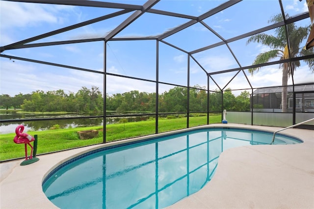 162 Canary Island Cir, Davenport, FL 33837 - swimming pool featuring a water view, a lawn, view of scattered trees, and a patio area