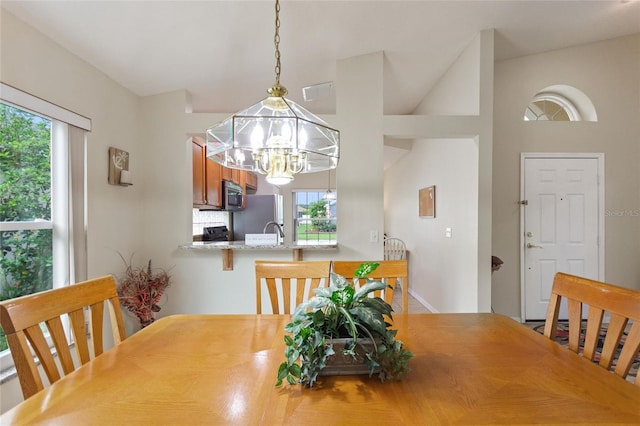 162 Canary Island Cir, Davenport, FL 33837 - dining area featuring a chandelier