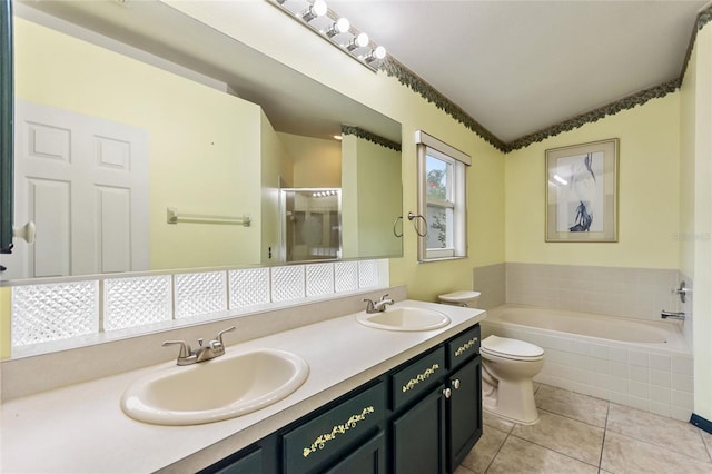 162 Canary Island Cir, Davenport, FL 33837 - full bath with lofted ceiling, a garden tub, tile patterned flooring, and double vanity