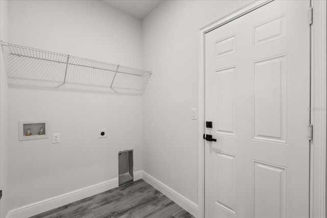 16057 SW 17th Ave, Ocala, FL 34473 - laundry room featuring electric dryer hookup, dark wood-style floors, and hookup for a washing machine