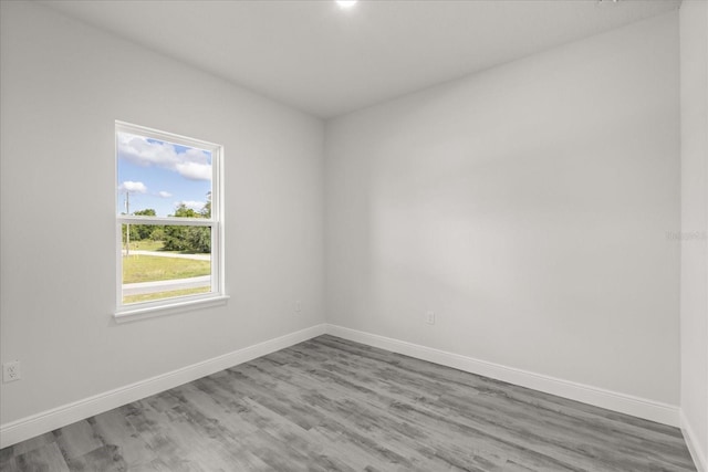 16057 SW 17th Ave, Ocala, FL 34473 - unfurnished room with baseboards and wood finished floors
