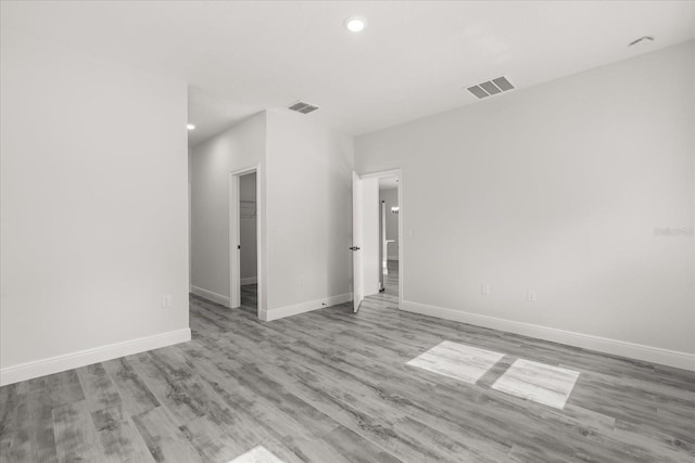 16057 SW 17th Ave, Ocala, FL 34473 - empty room with recessed lighting and wood finished floors