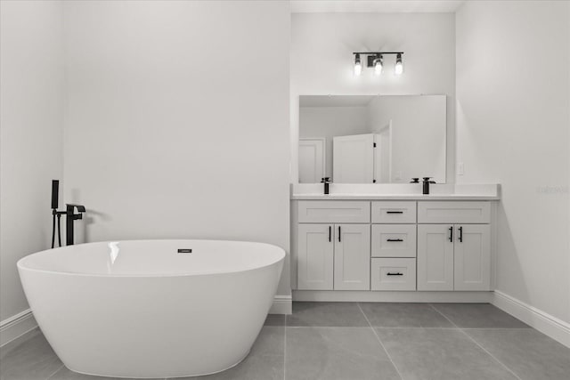 16057 SW 17th Ave, Ocala, FL 34473 - bathroom with double vanity and a soaking tub