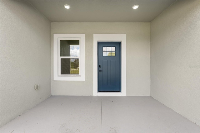 16057 SW 17th Ave, Ocala, FL 34473 - view of exterior entry featuring stucco siding