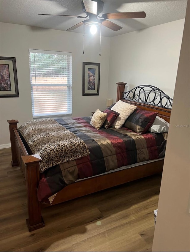 4805 SW 171st Ct, Dunnellon, FL 34432 - bedroom featuring wood finished floors and a ceiling fan