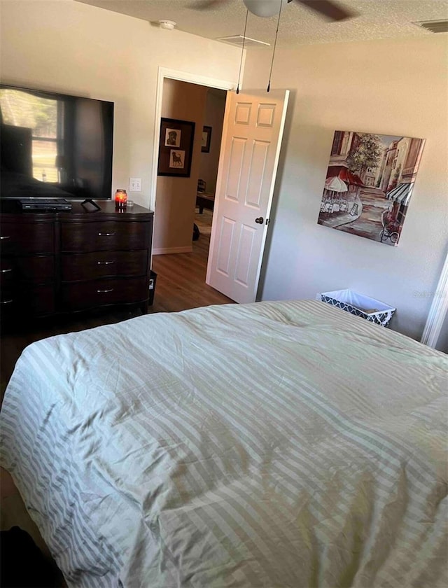 4805 SW 171st Ct, Dunnellon, FL 34432 - bedroom with wood finished floors and ceiling fan
