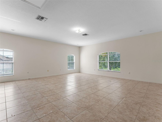 3774 Eagle Isle Cir, Kissimmee, FL 34746 - spare room with light tile patterned floors
