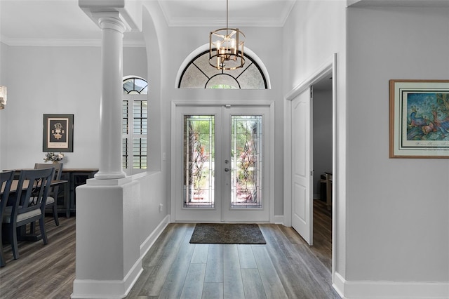 1640 Wild Indigo Ter, Oviedo, FL 32766 - entryway featuring decorative columns, french doors, wood finished floors, and ornamental molding