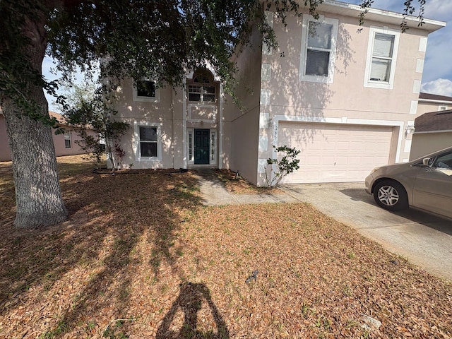 266 Vervain Ave, Davenport, FL 33837 - multi unit property featuring a garage, stucco siding, and concrete driveway