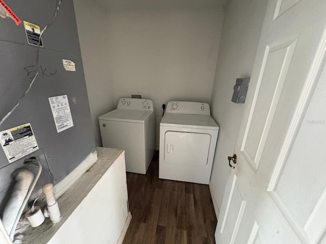 266 Vervain Ave, Davenport, FL 33837 - laundry area with washing machine and dryer and dark wood-style floors