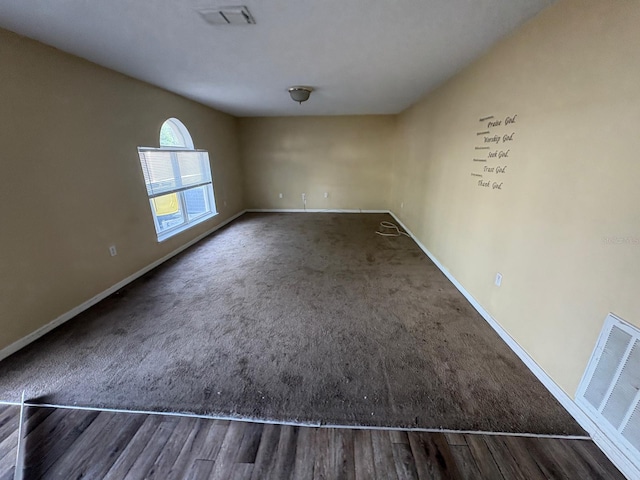 266 Vervain Ave, Davenport, FL 33837 - carpeted spare room with wood finished floors