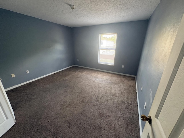 266 Vervain Ave, Davenport, FL 33837 - carpeted empty room with a textured ceiling
