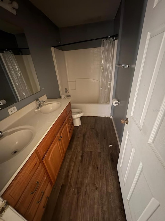 266 Vervain Ave, Davenport, FL 33837 - full bath featuring wood finished floors, double vanity, and shower / bathtub combination with curtain