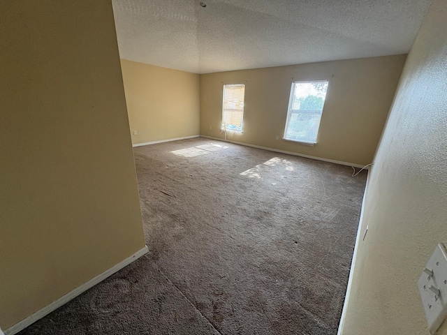 266 Vervain Ave, Davenport, FL 33837 - carpeted spare room featuring a textured ceiling