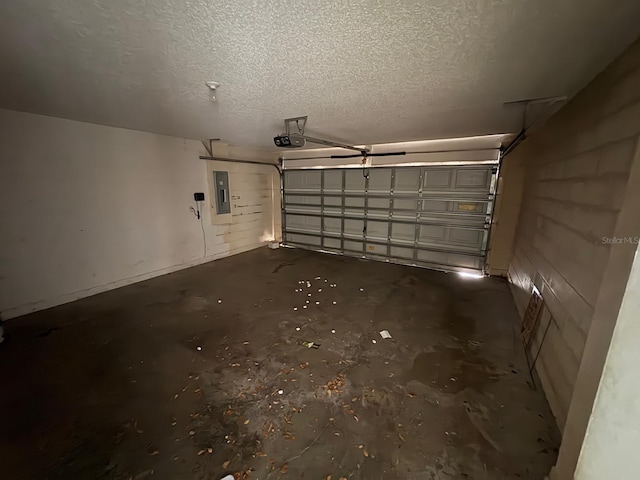 266 Vervain Ave, Davenport, FL 33837 - garage featuring electric panel and a garage door opener