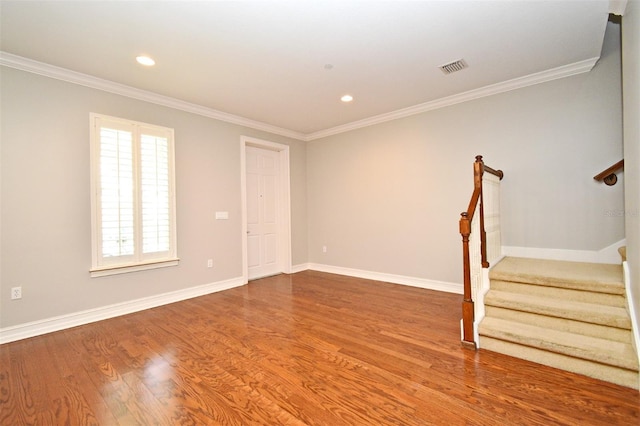 1649 Lake Baldwin Ln, Orlando, FL 32814 - spare room with stairway, ornamental molding, wood finished floors, and recessed lighting