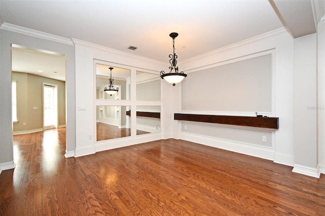 1649 Lake Baldwin Ln, Orlando, FL 32814 - spare room with wood finished floors and crown molding