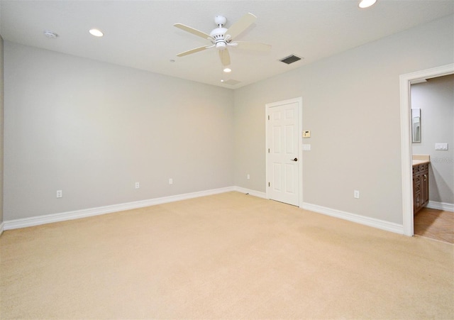 1649 Lake Baldwin Ln, Orlando, FL 32814 - unfurnished bedroom featuring light carpet, recessed lighting, connected bathroom, and a ceiling fan