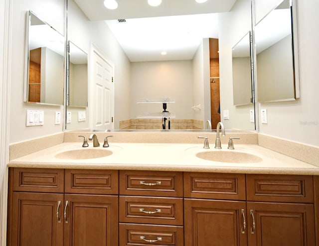 1649 Lake Baldwin Ln, Orlando, FL 32814 - full bathroom with double vanity and recessed lighting