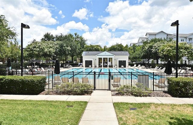 1649 Lake Baldwin Ln, Orlando, FL 32814 - community pool featuring a patio area