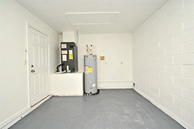 1502 W 16 Th St, Sanford, FL 32771 - garage featuring water heater, heating unit, and concrete block wall