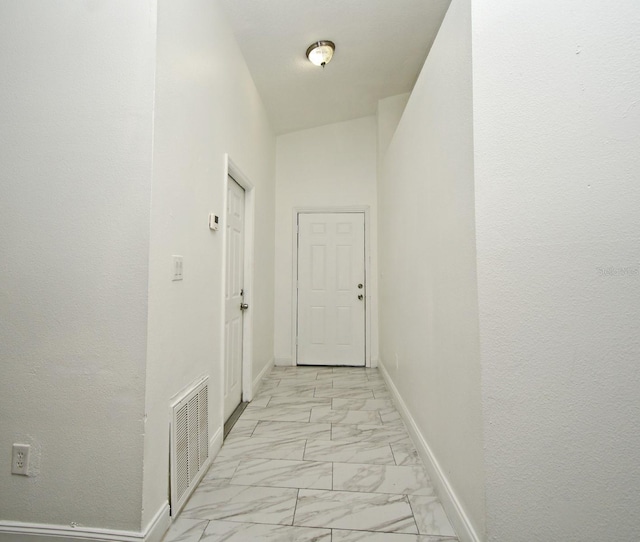 1502 W 16 Th St, Sanford, FL 32771 - corridor featuring light marble finish flooring and baseboards
