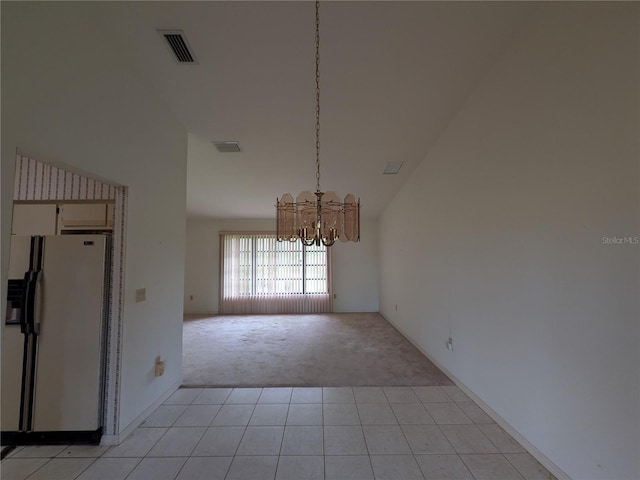 13382 Drummond Ave, Port Charlotte, FL 33953 - unfurnished dining area with light carpet, a chandelier, high vaulted ceiling, and light tile patterned flooring