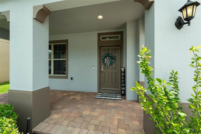 1270 Fountain Coin Loop, Orlando, FL 32828 - view of exterior entry featuring stucco siding