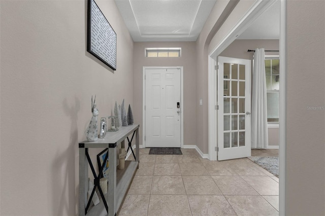 1270 Fountain Coin Loop, Orlando, FL 32828 - entrance foyer featuring light tile patterned flooring and baseboards