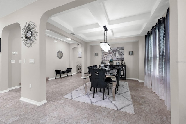 1270 Fountain Coin Loop, Orlando, FL 32828 - dining space featuring arched walkways, coffered ceiling, and beam ceiling
