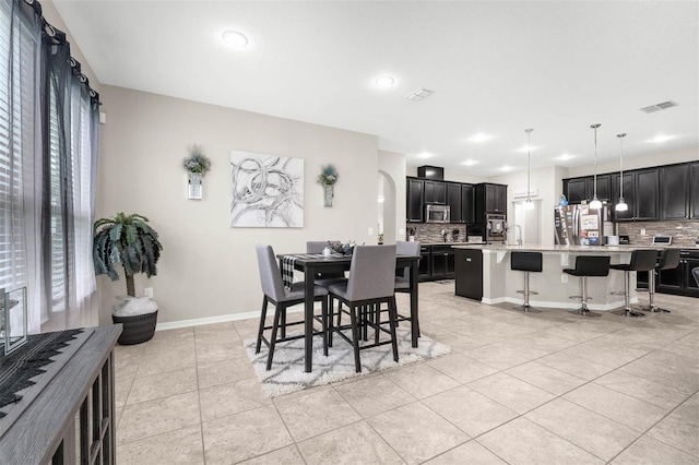 1270 Fountain Coin Loop, Orlando, FL 32828 - dining room with light tile patterned floors, plenty of natural light, and recessed lighting