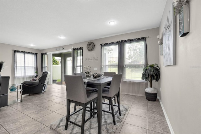 1270 Fountain Coin Loop, Orlando, FL 32828 - dining room featuring light tile patterned floors, healthy amount of natural light, and recessed lighting