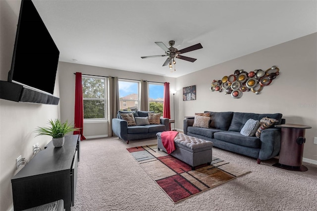 1270 Fountain Coin Loop, Orlando, FL 32828 - living room featuring carpet and a ceiling fan