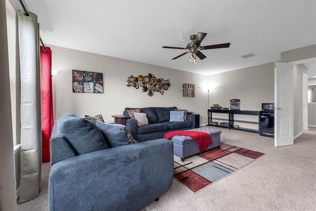 1270 Fountain Coin Loop, Orlando, FL 32828 - carpeted living room featuring a ceiling fan and baseboards