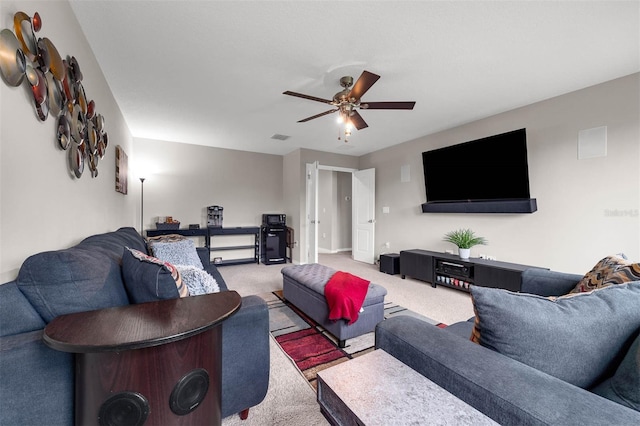 1270 Fountain Coin Loop, Orlando, FL 32828 - carpeted living area with ceiling fan and baseboards
