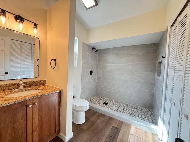 3055 Kirkland St, Deltona, FL 32738 - full bathroom with a closet, vanity, and tiled shower