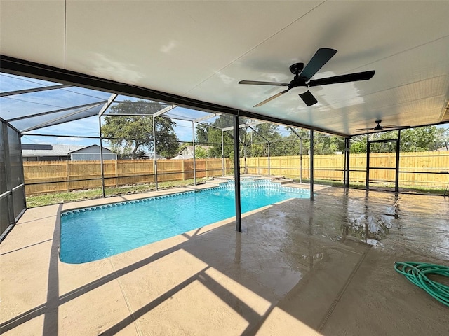 3055 Kirkland St, Deltona, FL 32738 - view of swimming pool featuring a fenced backyard, a patio area, glass enclosure, ceiling fan, and a pool with connected hot tub