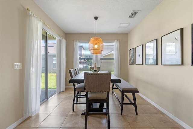 1958 Commander Way, Kissimmee, FL 34746 - dining room featuring light tile patterned floors