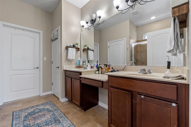 1958 Commander Way, Kissimmee, FL 34746 - bathroom featuring a shower stall, double vanity, a chandelier, and tile patterned floors