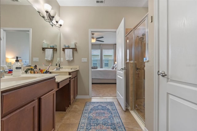 1958 Commander Way, Kissimmee, FL 34746 - ensuite bathroom featuring a shower stall, vanity, and ceiling fan