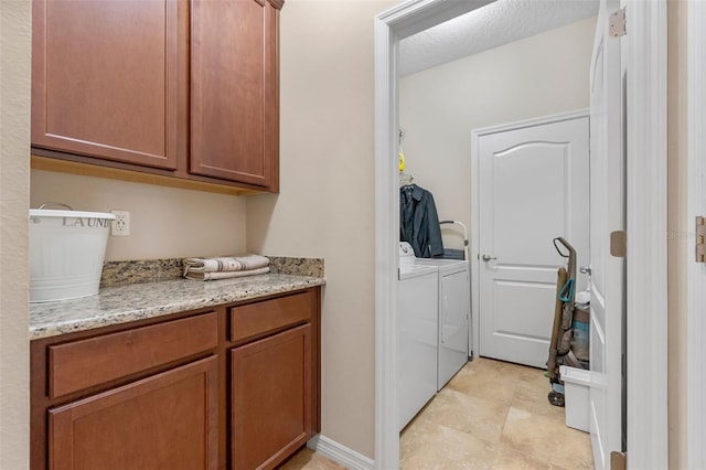 1958 Commander Way, Kissimmee, FL 34746 - laundry area featuring washing machine and clothes dryer and cabinet space