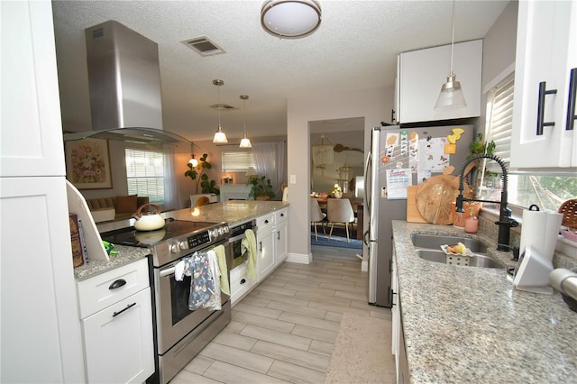 628 Riverview Ave, Altamonte Springs, FL 32714 - kitchen featuring appliances with stainless steel finishes, island range hood, white cabinets, pendant lighting, and light stone counters