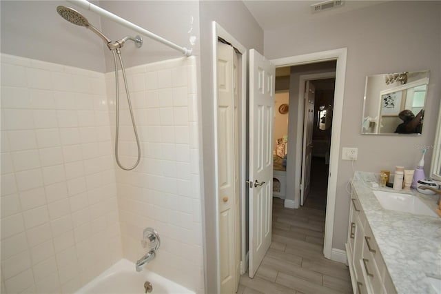 628 Riverview Ave, Altamonte Springs, FL 32714 - ensuite bathroom with vanity and washtub / shower combination
