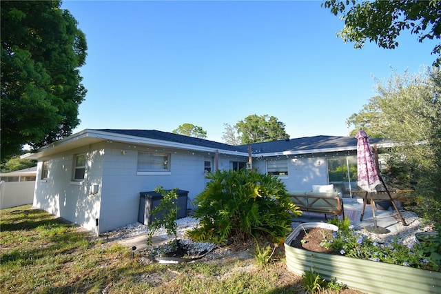 628 Riverview Ave, Altamonte Springs, FL 32714 - rear view of property with a patio and outdoor lounge area