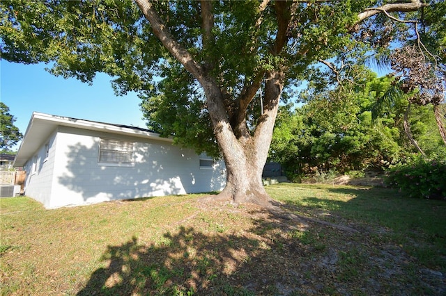 628 Riverview Ave, Altamonte Springs, FL 32714 - view of side of home with a lawn and a cooling unit