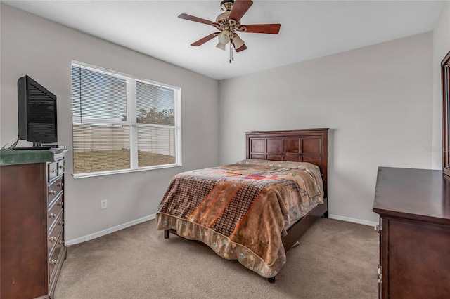 209 Grouper Ct, Poinciana, FL 34759 - bedroom with light carpet and a ceiling fan